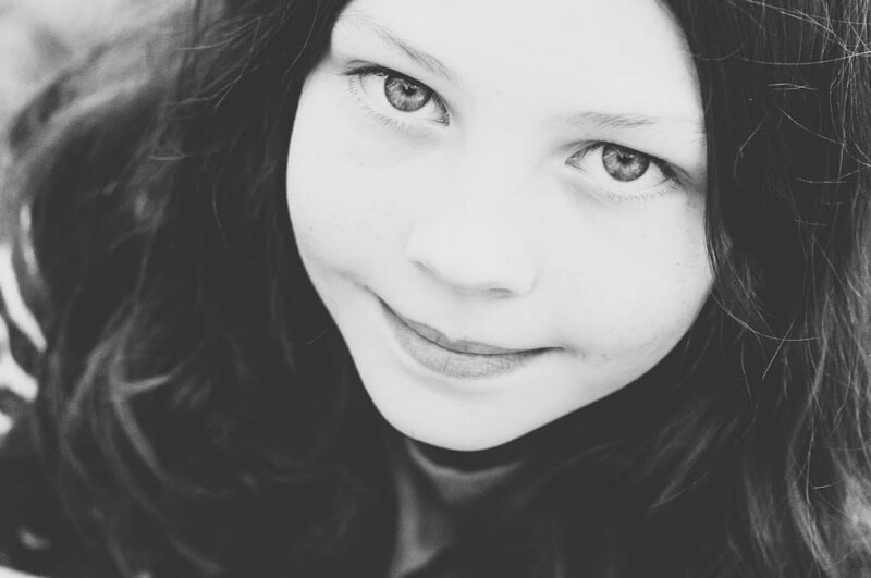 Greig Reid - Daughter Oct 12 faded black & white portrait