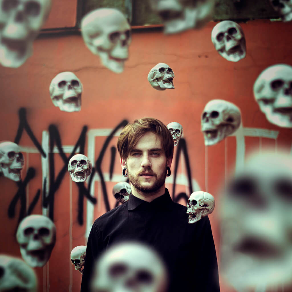 Isabella Mariana - Skulls around man