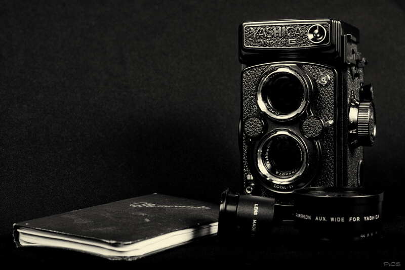 still life photography Yashica Mat-124 G with a notebook